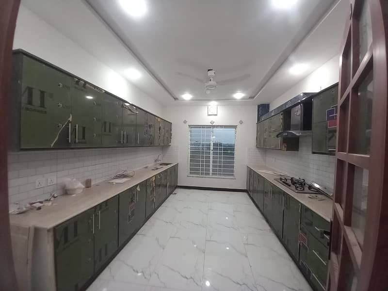 Brand New 1 Kanal Upper Portion Available For Rent, 3 Bed Room With attached Bath, Drawing Dinning, Kitchen, T. V Lounge, Servant Quarter 12