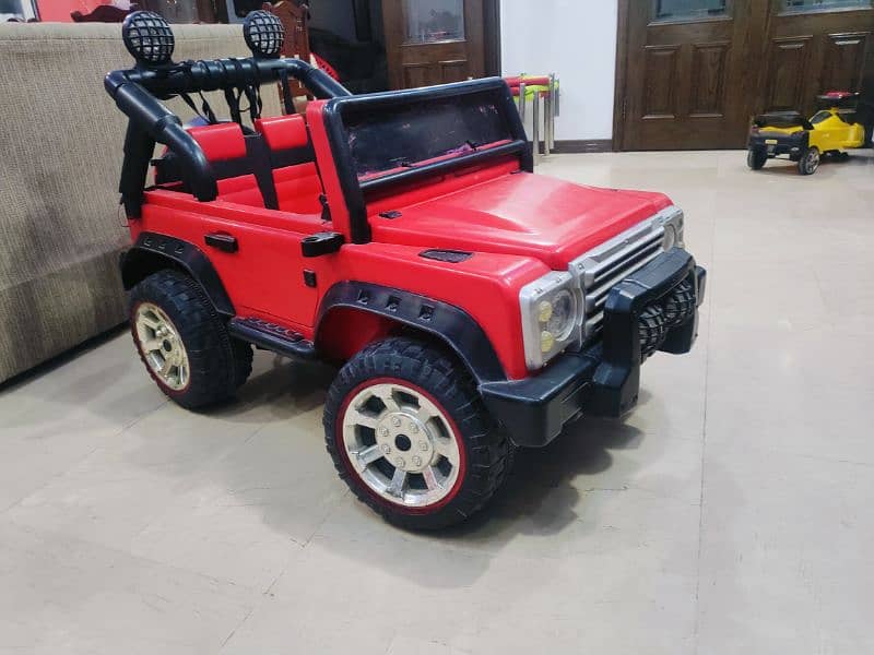 RED DOUBLE SEAT JEEP 1