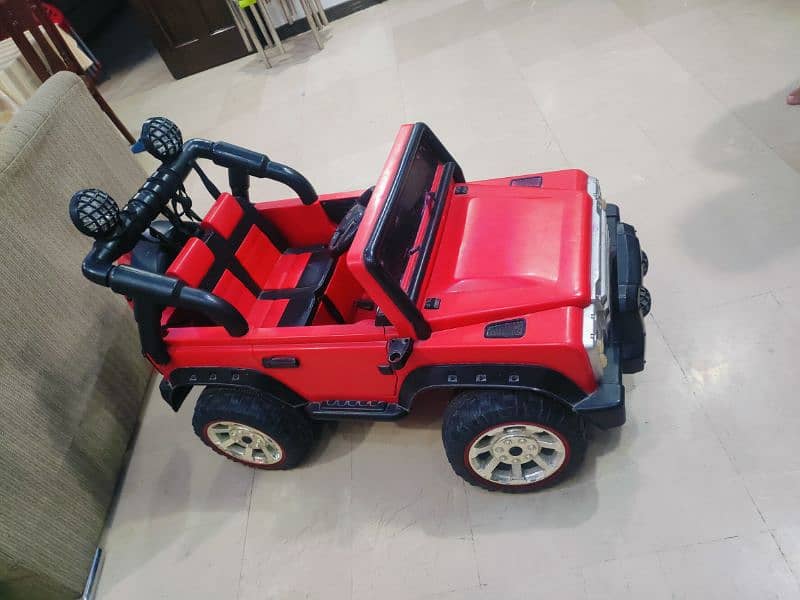 RED DOUBLE SEAT JEEP 2