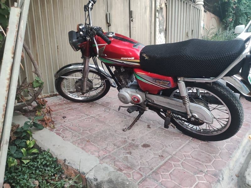 honda 125 2013 model ok condition red colour 0