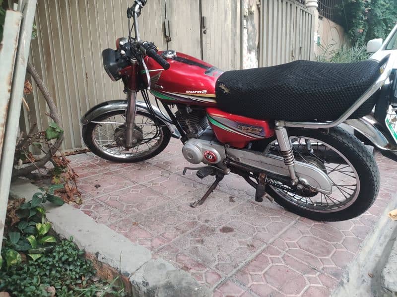 honda 125 2013 model ok condition red colour 1