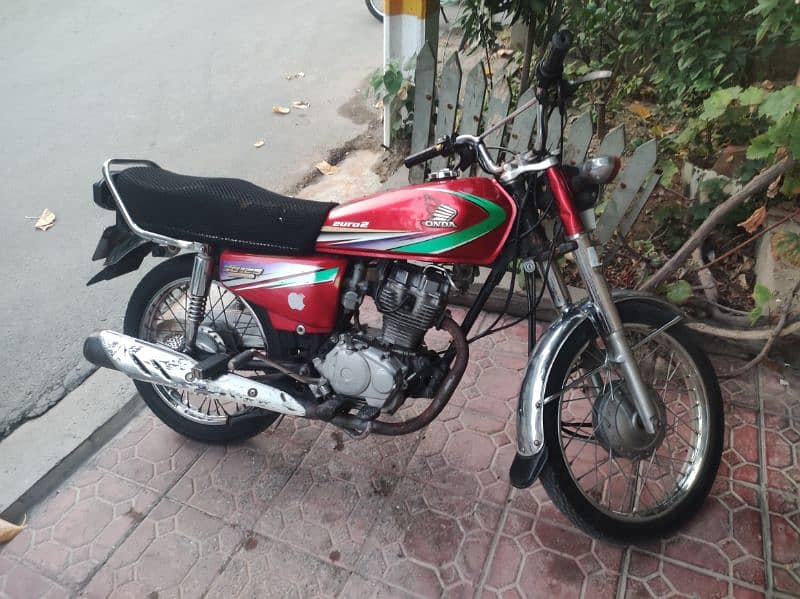 honda 125 2013 model ok condition red colour 5