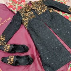 grooms black  embroidery shairwani with shoes and brand Zenia couture