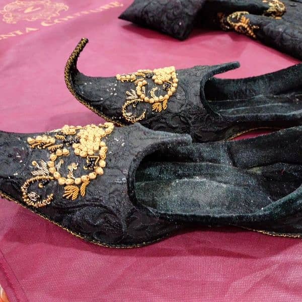 grooms black  embroidery shairwani with shoes and brand Zenia couture 1