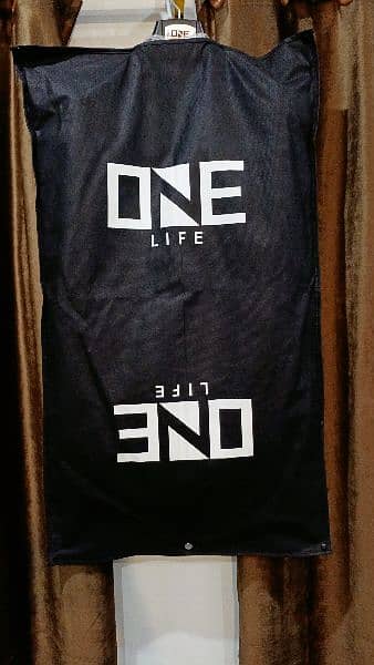 One life branded coat 3