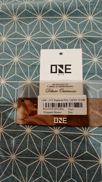 One life branded coat 5