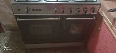 5 stove all working cooking range  with iron stand