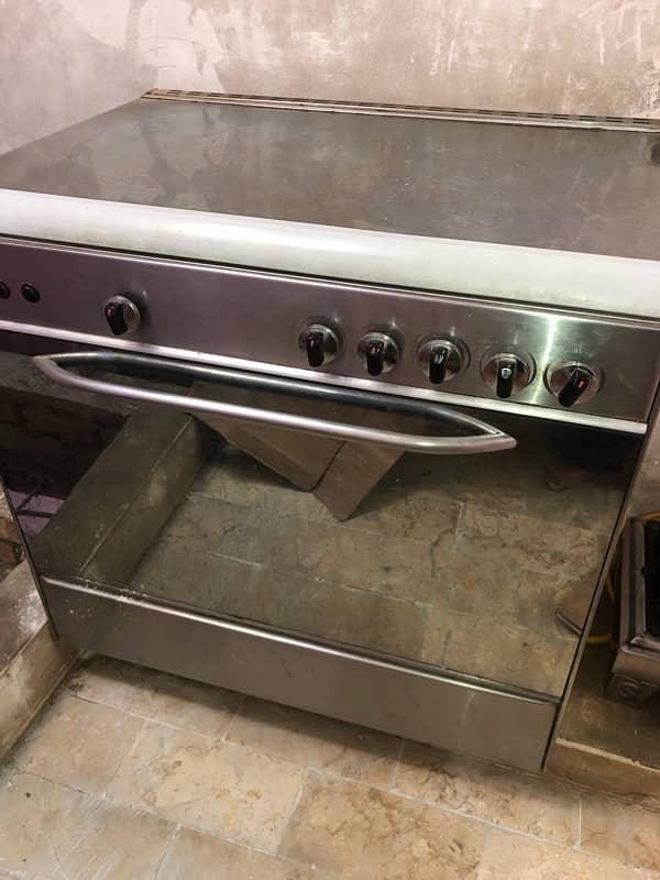 “Used Stainless Steel Gas Stove with Oven - 5 Burners” 0