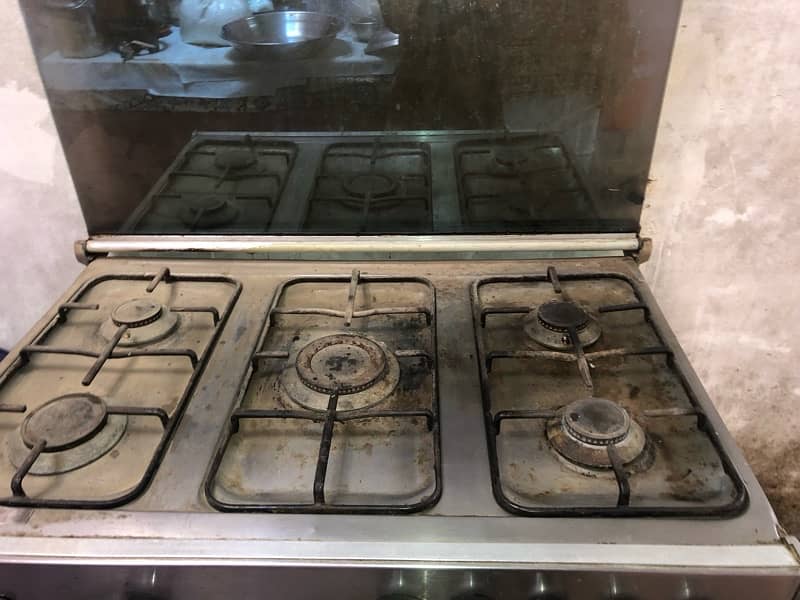 “Used Stainless Steel Gas Stove with Oven - 5 Burners” 2