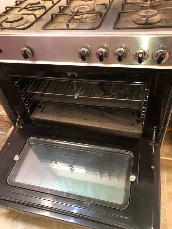 “Used Stainless Steel Gas Stove with Oven - 5 Burners” 4