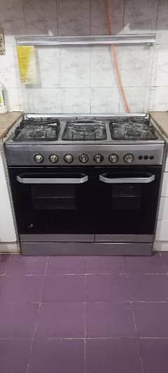 Slightly used Nasgas 5 burner cooking range oven for urgent sale