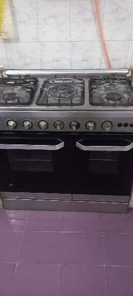 Slightly used Nasgas 5 burner cooking range oven for urgent sale 1