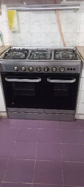 Slightly used Nasgas 5 burner cooking range oven for urgent sale 2