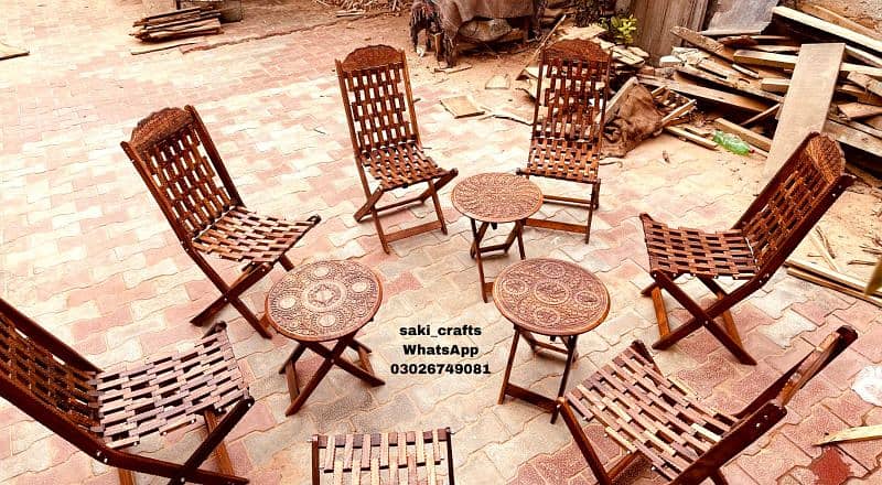 wooden folding chairs and table 0