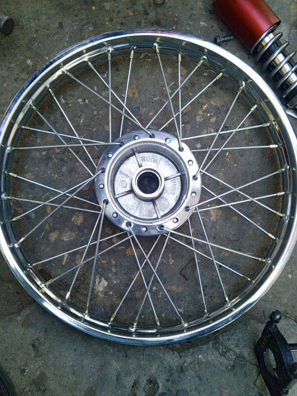 70 cc bike ka back side wheel & rimm price 3500 only 0