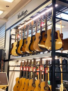 Wow Guitars Violins Cajon Store in Islamabad city Best Guitar shop