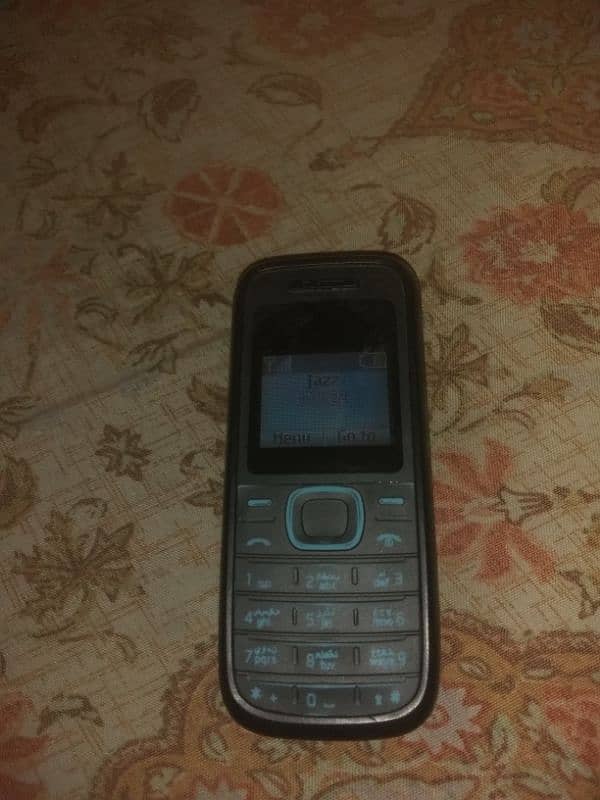 Nokia 1208 qwerty keypad good phone pta approved urgent sale 2