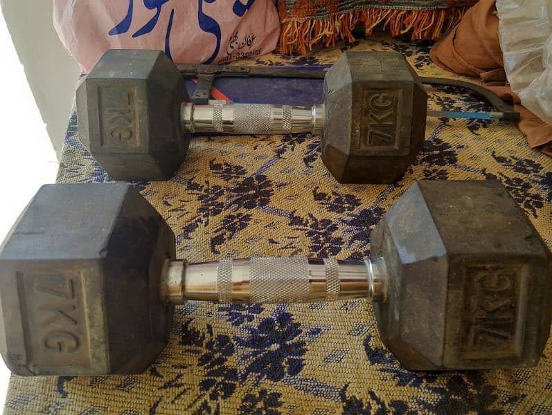 Almost new , slightly dumbbells 7 kg set 1