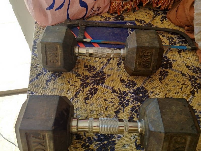 Almost new , slightly dumbbells 7 kg set 3