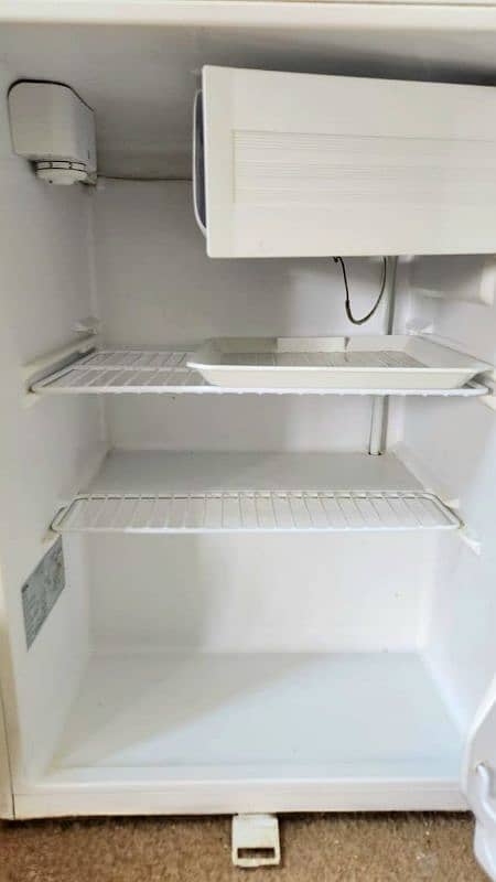 Haier Single-door Room fridge with Freezer Compartment 1