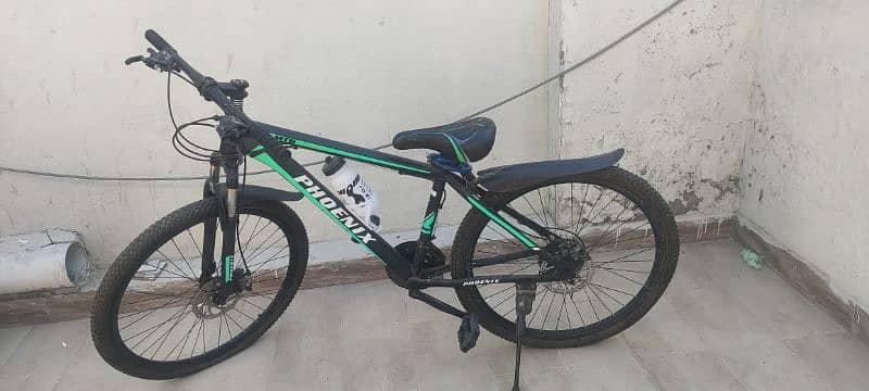 New bike very less used urgent sell 4