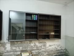 Book shelves with sliding glass