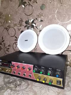 4 ceiling speaker with amplifier. . . almost new condition. . . 0