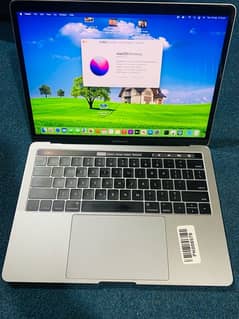 MacBookpro  model 2016 core i7  13 inch ram 16 256 ssd tauch bar 0