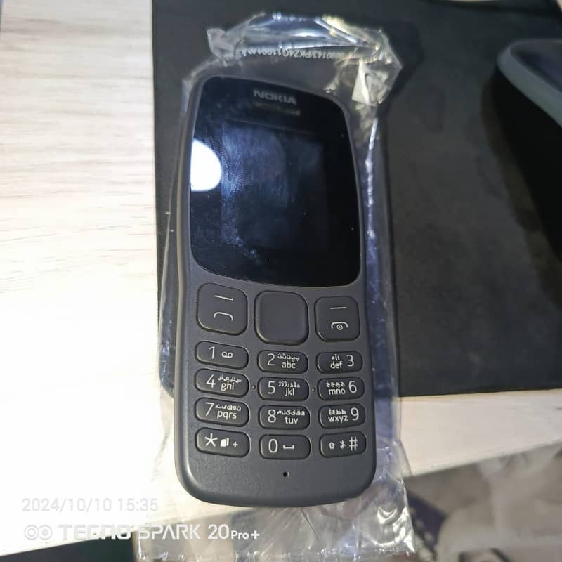 Nokia 106 + Box and Accessoires 0