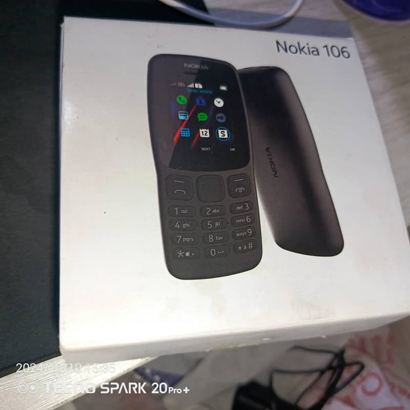 Nokia 106 + Box and Accessoires 2