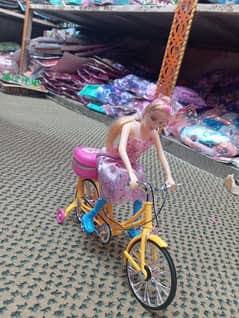 musical bicycle and musical telephone and revolver girl toy