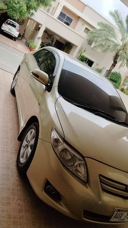 Toyota Corolla Altis 2011 sunroof 1.8 sr first owner 7