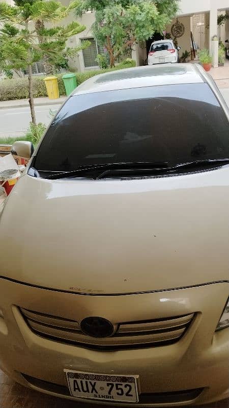 Toyota Corolla Altis 2011 sunroof 1.8 sr first owner 10