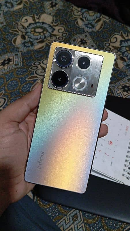 Infinix note 40 golden addition PTA approved 5