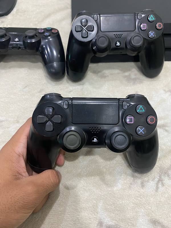 Ps4 Pro 1TB with 3 Controllers 9