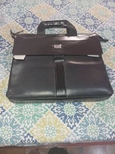 bhai yeh original leather laptop bag hai