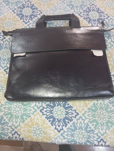 bhai yeh original leather laptop bag hai 1