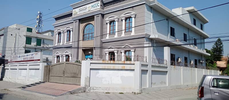 2 Kanal Triple Story Corner Commercial Building Available for rent. 0