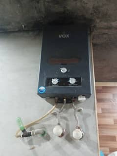 geyser VOX Company 1 year used black color fresh condition