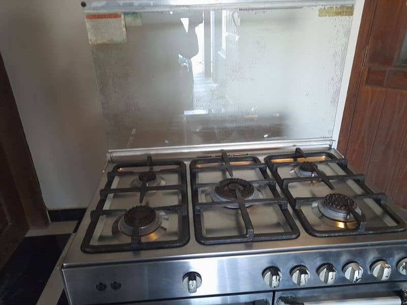 coooking range with 5 burners and glass tempered top,auto ignition 4