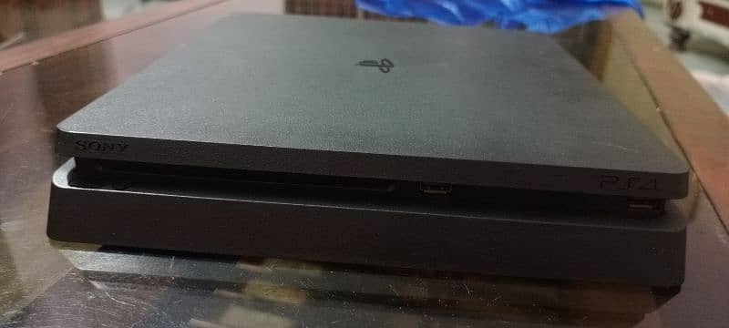 Ps4 Slim 500Gb With Two Controllers and 4 games Only 60,000 Rupees 1