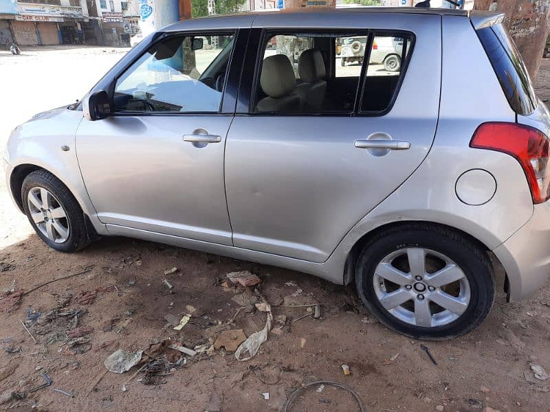 Family used car Suzuki Swift DLX 1.3 Silver 2010 3