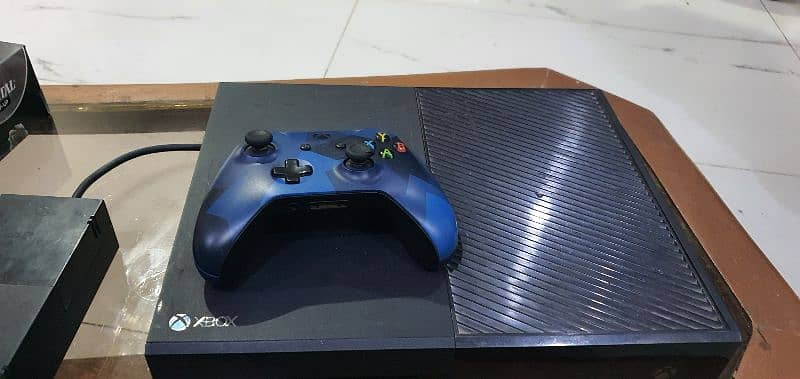 xbox one 1TB one controller with 4 parosasar wala  numbers 03196580498 1