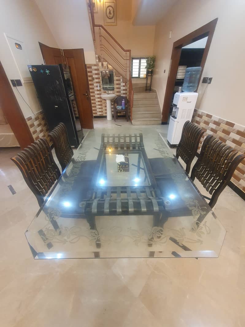 8 mm table glass top with black color shesham wooden base + 4 chair 0