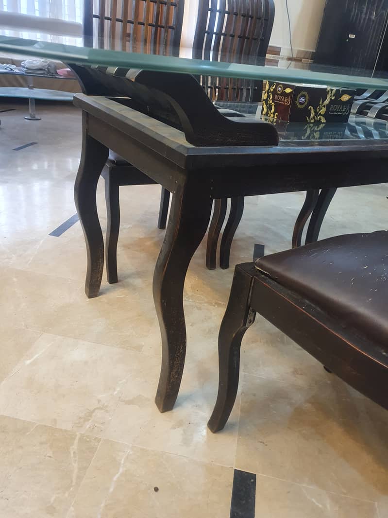 8 mm table glass top with black color shesham wooden base + 4 chair 4