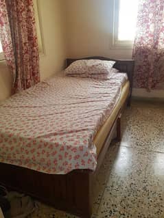 Strong wooden bed for sale 0