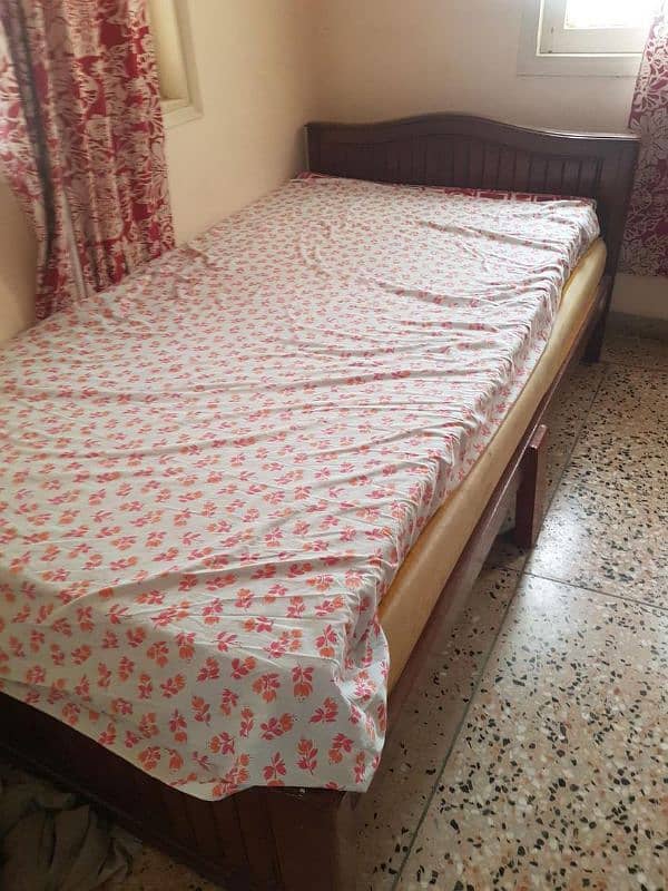 Strong wooden bed for sale 1