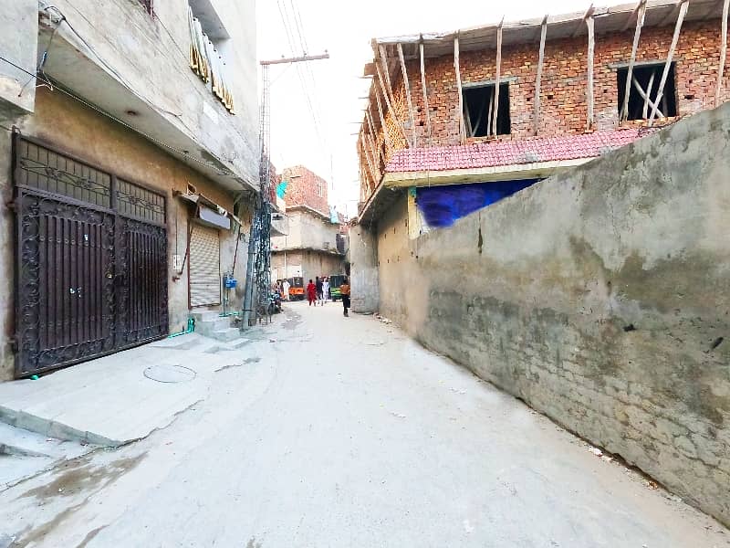 9 Marla House With 1 Shop Is Available For Sale In Wafaqi Colony Lahore. . 10