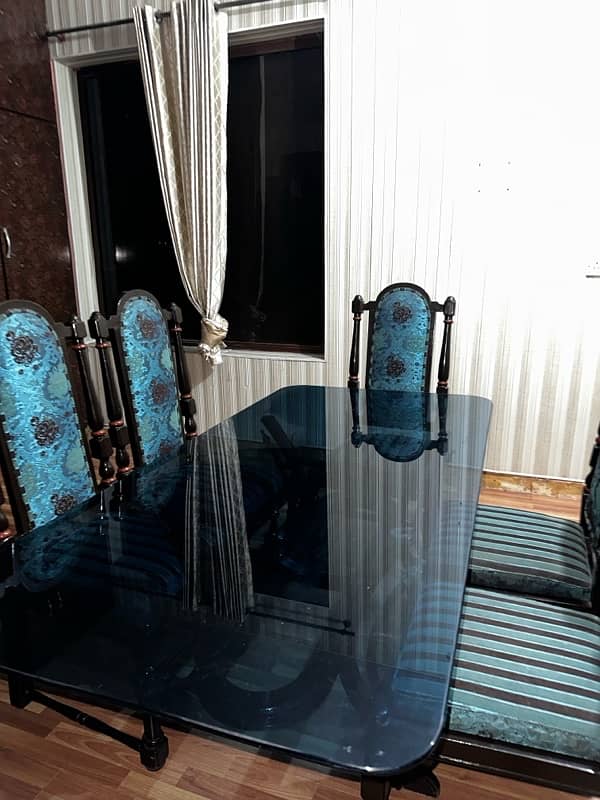 glass dinning table with 6 chairs 0