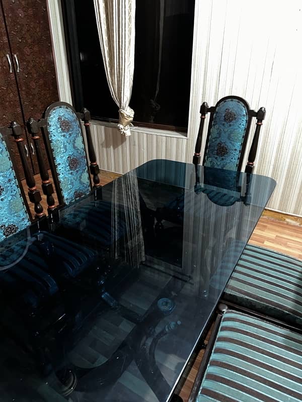 glass dinning table with 6 chairs 1